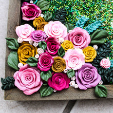 Load image into Gallery viewer, Colorful floral arrangement on a textured surface
