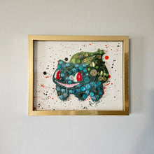 Load image into Gallery viewer, A framed artwork featuring a stylized dinosaur created with buttons and beads, mounted on a gold shadow frame.