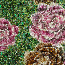 Load image into Gallery viewer, Decorative flowers made of beads on a textured surface
