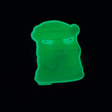 Load image into Gallery viewer, Glowing green plastic toy figure on a black background
