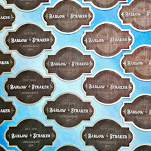 Load image into Gallery viewer, Pattern of Barlow &amp; Straker labels on a blue background
