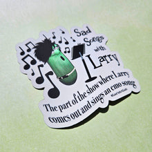 Load image into Gallery viewer, Sticker with text 'Sad Songs with Larry' featuring a character and musical notes on a light green background.
